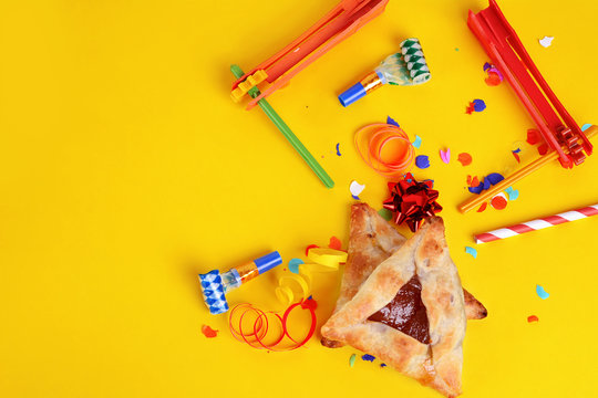 Purim Background With Party Costume And Hamantaschen Cookies.