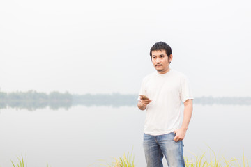 man at the blue lake