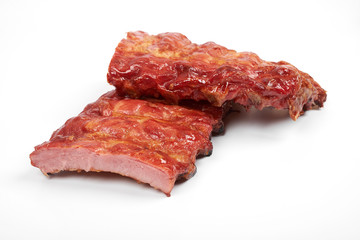 portion of delicious spicy marinated pork ribs isolated on white background.