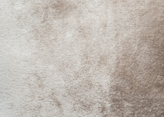 Beige velvet background or velour flannel texture made of cotton or wool with soft fluffy velvety...