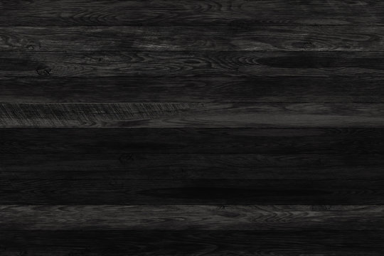 Black wood background, charred planks, painted black stain boards