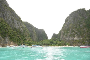 Numbers of tourists and speed boats in Maya bay