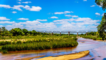 Railway Truss Bridge over the Sabie River at Skukuza Rest Camp in Kruger National Park in South...