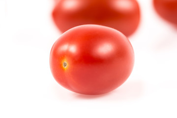 Cherry tomato on white