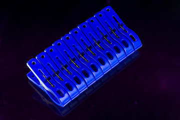 blue new plastic clothespins