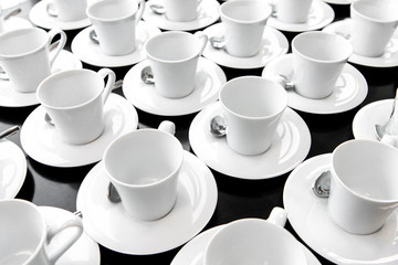 Group of ceramic white cup serving tea or coffee.
