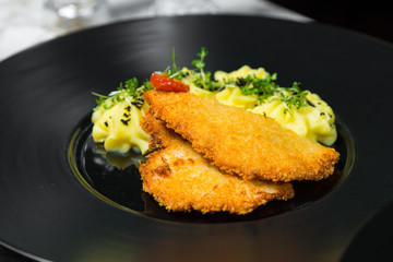 Dinner. Chef's specialty presented in restaurant on served table. Clouse up.