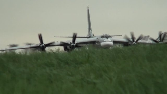 Bomber taxis in the grass