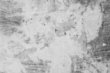 Old concrete wall with scuffs of gray color, texture background