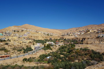 Fototapeta na wymiar Cityscape of Wadi Musa. It is the nearest town to the archaeological site of Petra, Wadi Musa, Jordan, Middle East