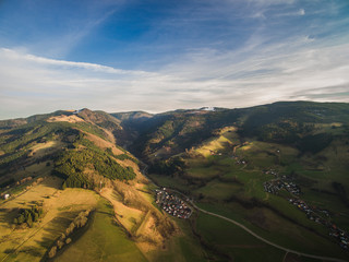 arial view of majestic landscape with hills and town in Germany