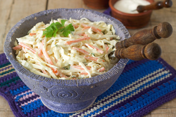 Coleslaw Salad from cabbage and carrots with dressing mayonnaise.