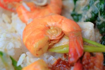Nasi campur includes rice, mix vegetables and prawn.