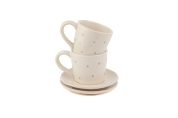 Beige ceramic cups for coffee or tea, white background