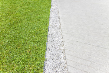 Green lawn with stone floor - image with copy space