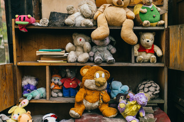 Vintage old toys. Unneeded, dumped, abandoned fluffy stuffed toys. Place of lost fairy tale heroes....