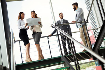 Picture of business colleagues talking in office