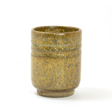 Ceramic tea glass Japanese style at center of image on white background