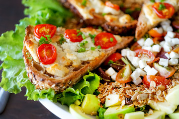 Salad chevre chaud. French kitchen. Close-up.