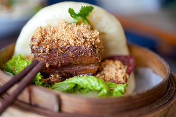 Bao burger - close-up. Food sticks and Chinese food. Macro 