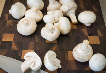 Heap of mushrooms: sliced champignons as ingredients for cooking dinner