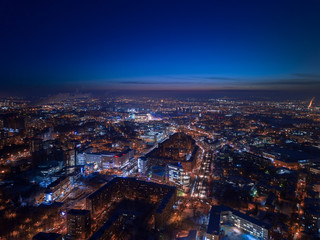 View of the night city in winter from a bird's eye view