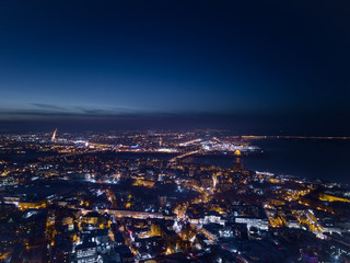 View of the night city in winter from a bird's eye view