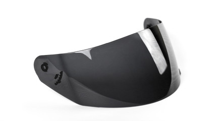 Black visor for the helmet. Tinted glass for the helmet. Close up. Isolated on a white background