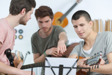 Young men in band rehearsal