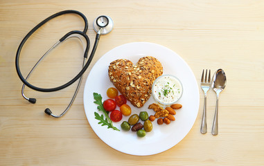 healthy food for your heart, healthy meal and stethoscope