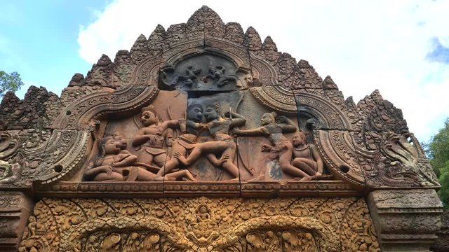 carving of a fight scene  between valin and sugriva on the west pediment of banteay srei temple angkor, cambodia