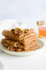 Pancakes with figs and honey.