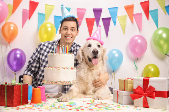 Young Guy With A Dog Celebrating A Birthday