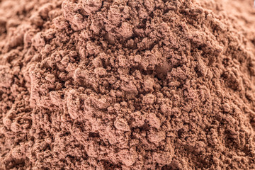 Cocоa powder or carob powder close-up.