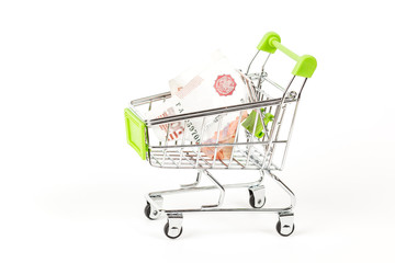 Food trolley, full of Russian 5000 banknotes. On a white background.
