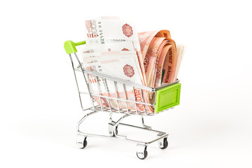 Food trolley, full of Russian 5000 banknotes. On a white background.