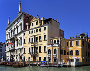 Obraz na płótnie Canvas Venice historic city center, Veneto rigion, Italy - view on the Palazzo residences with vaporetto water taxis and gondolas on the Grand Canal