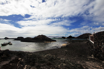 the clouds run fast on an inlet of an island in the Canary archipelago, Spain