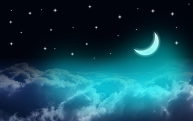 Fototapeta na wymiar Crescent moon over clouds in a starry night