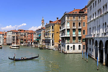 Venice historic city center, Veneto rigion, Italy - view on the Palazzo residences with vaporetto water taxis and gondolas on the Grand Canal - obrazy, fototapety, plakaty