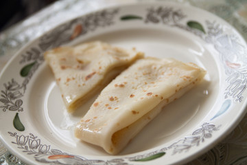 a fresh baked pancake on a plate