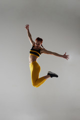 happy sportswoman jumping