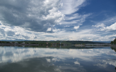 Clouds reflecting on water