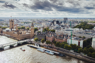 Beautiful view of London with its famous builduings: Big Ben, Palace of Westmisnter, Westmisnter Bridge under opened sky. Outdoor shot of capital of Great Britain. - obrazy, fototapety, plakaty