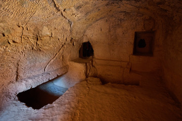 ancient burial chamber at the 'Tomb of the Kings in Paphos, Cyprus.