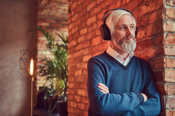 Portrait of an old man with a gray beard.
