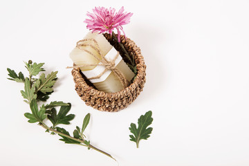 natural handmade soap with flower and leaves.top view.white background