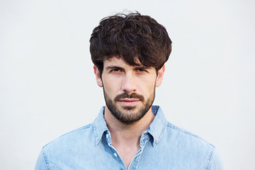 Obraz premium Close up handsome male fashion model face with beard