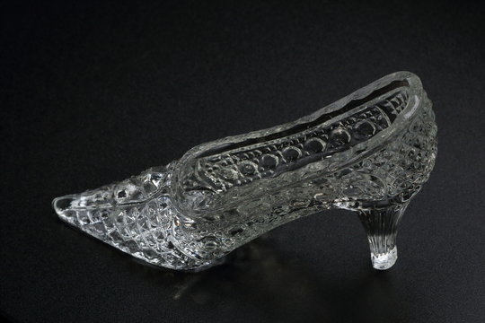 Crystal Cinderella Shoe on a dark background. Decorative accessory