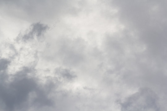 thin grey cloud on white sky